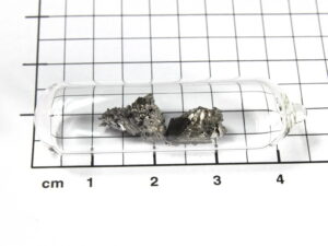 2.22 grams Erbium metal 99.95%/TREM in ampoule under argon