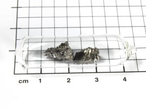 2.22 grams Erbium metal 99.95%/TREM in ampoule under argon